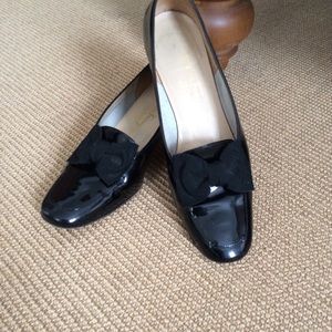 - Ferragamo black patent leather bow flats